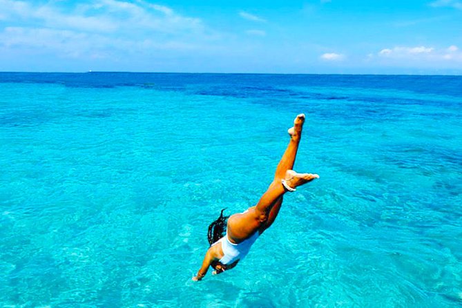 Ibiza Beach Hopping Cruise with Paddleboards, Drinks and Food 6h - Family-friendly comfort without feeling like a kids club
