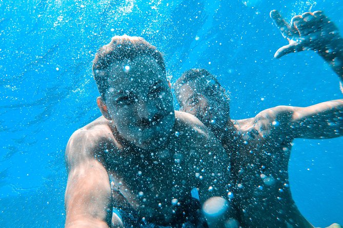 Ibiza Ocean Club Boat Party with 3 Hours Premium Drinks and DJ - From Vanilla Beach check-in to sailing from Playa d’en Bossa