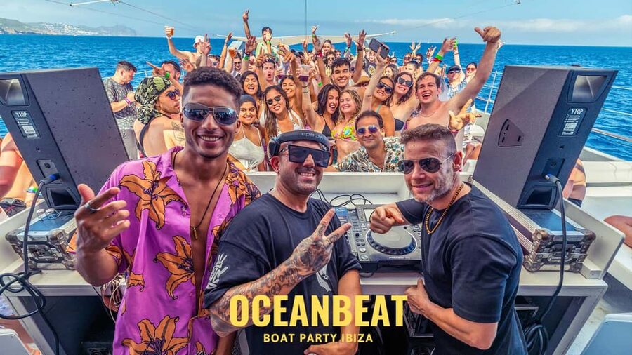 Ibiza: Ocean Club Boat Party with Premium Drinks, Food, & DJ - The Swim Stop in Turquoise Water, From Top-Deck Flips to SPF Help