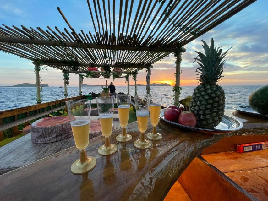 Ibiza: Sea Caves & Coves Snorkeling Paddle Boarding Tour - The Boat Experience: Deck Space, Jungle-Pirate Decor, and Drinks on Tap