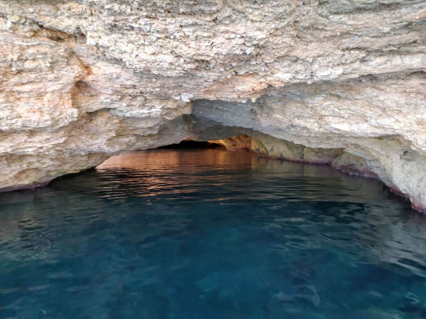 Ibiza: Snorkeling and SUP Paddle, Beach and Cave Boat Tour - Cala Conta stretch and the sea cave option