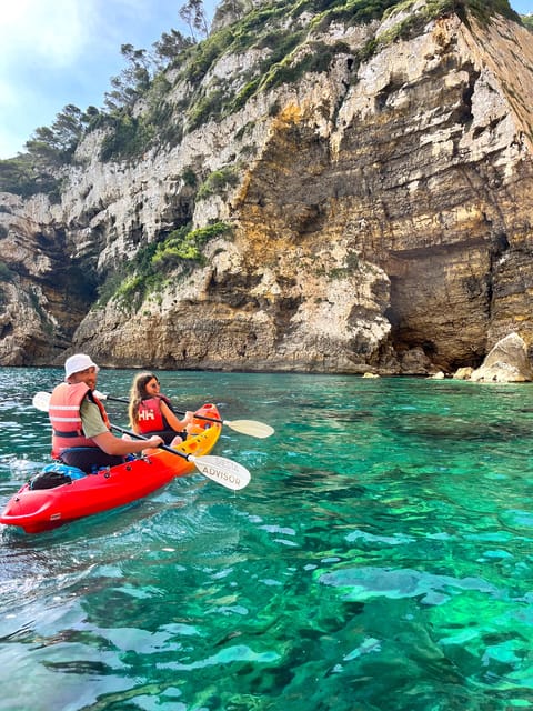 Jávea: Cala Portixol Kayak Tour with Snorkel & Cliff Jumping - Blue Lagoon swim finish: calmer water, clear payoff