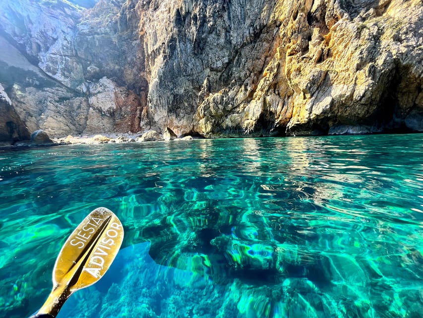 Jávea: Cala Portixol Kayak Tour with Snorkel & Cliff Jumping - Cala el Pom snorkeling: clear water and cave-adjacent swimming