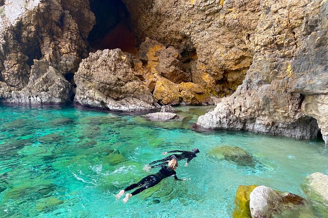Kayak Paradise: Cala Portixol Snorkel, Cave & Cliff Jumping Tour - Isla de Portixol: Secret Cave Photos and the Blue Lagoon Stop
