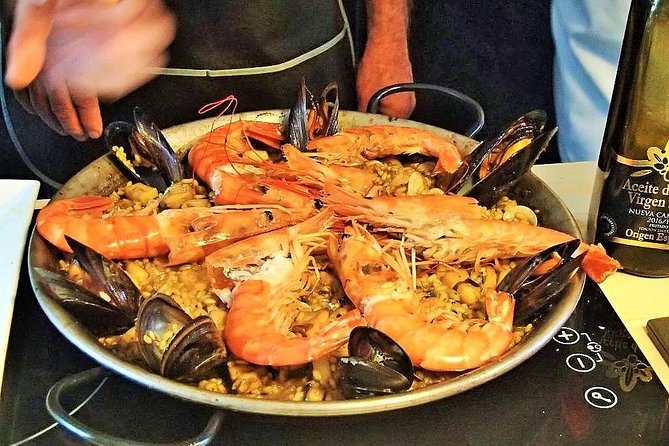 La Boqueria Market and Paella Cooking Class in Barcelona - La Boqueria market tour: ingredients with stories, not just shopping