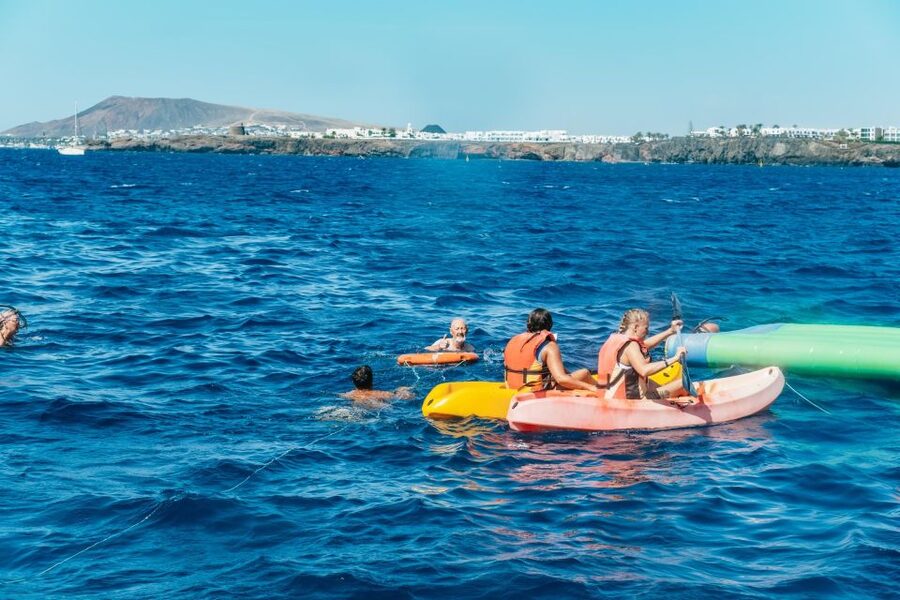 Lanzarote: Day Trip to the Papagayo Beaches by Catamaran - Lunch on board: paella, tomato pasta, and fruit that keeps you going