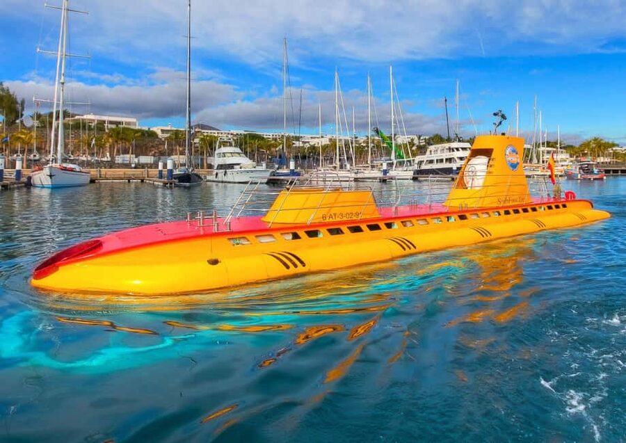Lanzarote: Real Submarine Dive with Hotel Pickup - Shipwrecks and marine life: what you should expect to spot