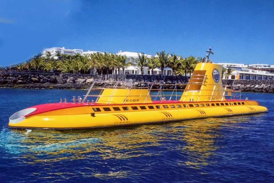 Lanzarote: Real Submarine Dive with Hotel Pickup - The hour underwater: ports, monitors, and comfort that actually helps