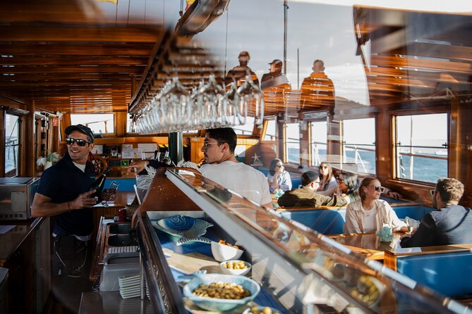 Live Music & Sunset Wooden Boat in Barcelona - The Turkish gulet vibe: seating, decks, and how to pick your spot