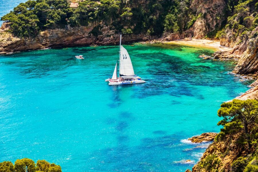 Lloret de Mar: Catamaran Sailing Cruise with BBQ and Drinks - Onboard BBQ timing: eat after you swim, not before