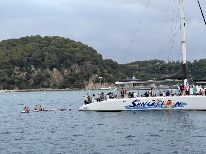 Lloret de Mar: Sunset Catamaran Cruise with DJ and Drinks - Practical Tips: What to Bring and What to Leave Behind
