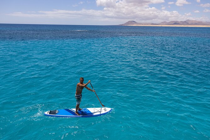 Lobos Island Half-Day Sailing Tour with Lunch - Lunch and drinks onboard: paella, fruit, and a few important realities