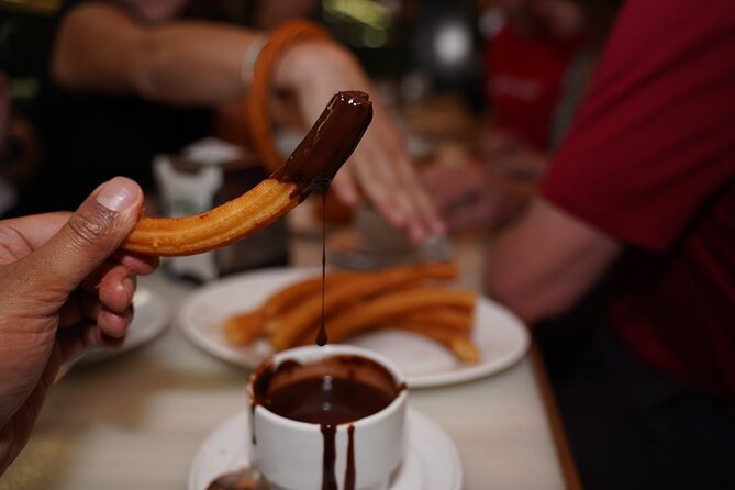 Madrid by Night: Tapas Crawl, Local Drinks & Hidden Gems - Plaza Mayor: bocadillo de calamares and 1860 croquettes