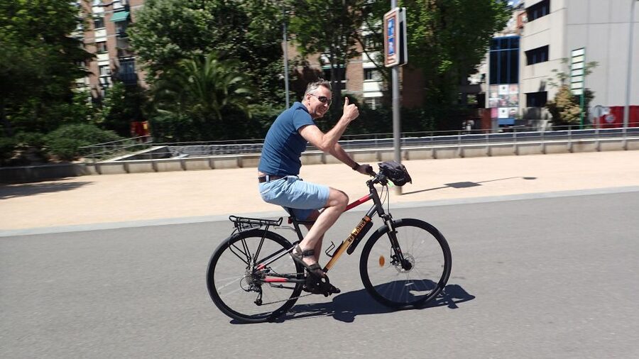 Madrid City Guided Bike/E-Bike Tour for Small Groups - Las Cortes and Parliament views, then the gentle climb to Retiro