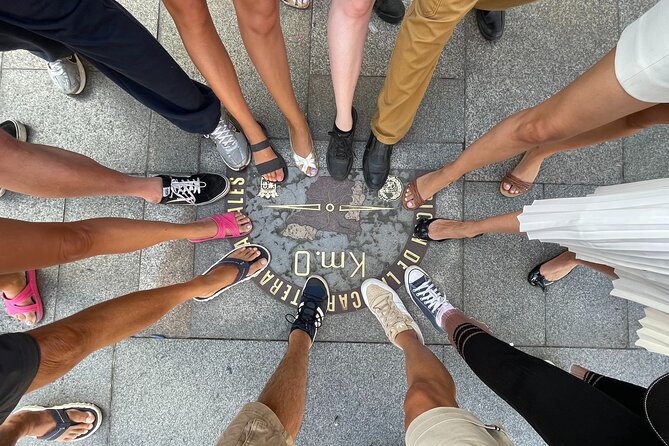 Madrid Essential: Historic Center, Plaza Mayor & Royal Palace - Puerta del Sol: where Madrid time, Km 0, and Carlos III meet