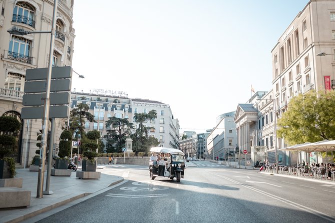 Madrid Historical Tour with Local Guide in Eco Tuk Tuk Private - A private electric tuk-tuk that keeps your day moving