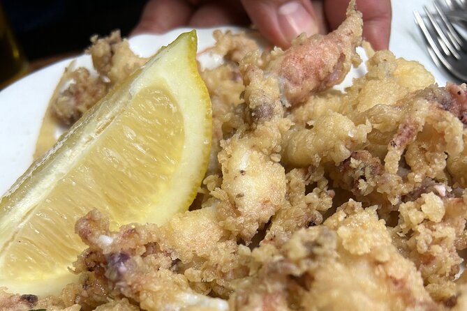 Madrid Local Tapas Tour with Private Dinner and Bottomless Wine - Stop 1: The Cooking Clubhouse Cava Welcome at Calle de Atocha