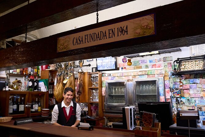 Madrid: Not Just Another Tapas & Wine Tour by Eating Europe - La Campana and La Trucha: Classic Tavern Energy, Proper Portions