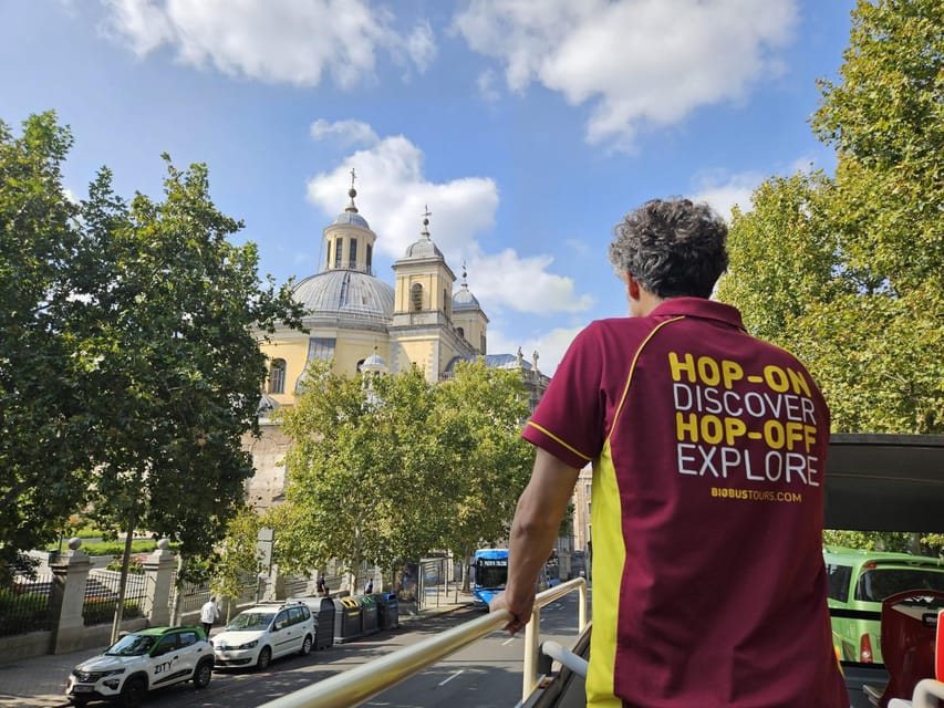 Madrid: Open-Top Big Bus Sightseeing Tour with Live Guide - Puerta de Alcalá and the Big Piazza Moments