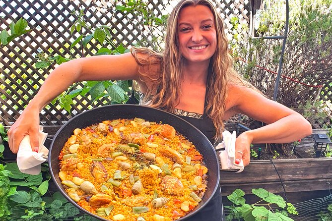 Madrid: Paella & Sangria Classes- Seafood, Chicken & Vegan option - Tapas break: tortilla, ham toast, and more small bites