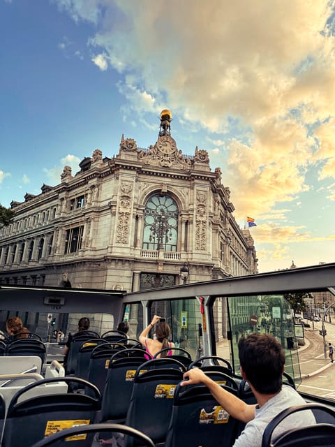 Madrid: Panoramic Open-Top Bus Day or Night Tour with Guide - Plaza de Cibeles and the Metropolis Building, Big-City Drama Up Close