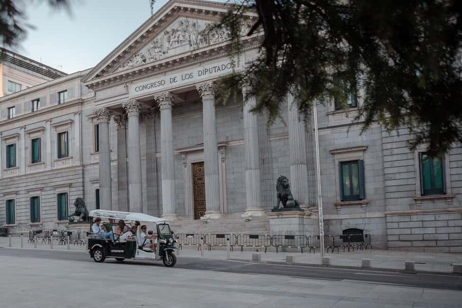 Madrid: Private City Tour by Eco Tuk Tuk - Where You Meet by the Royal Palace: Plaza de Oriente Details That Matter