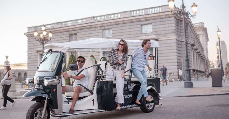 Madrid: Private City Tour by Eco Tuk Tuk - San Miguel and the Old-Center Glow: Market Energy Without the Ticket Hassle