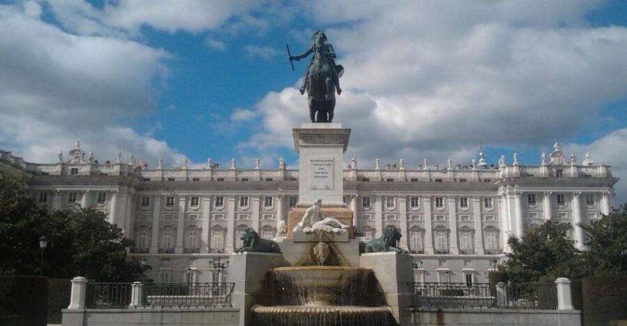 Madrid: Royal Palace and Almudena Cathedral Small-Group Tour - Inside the palace, where the guide focuses attention
