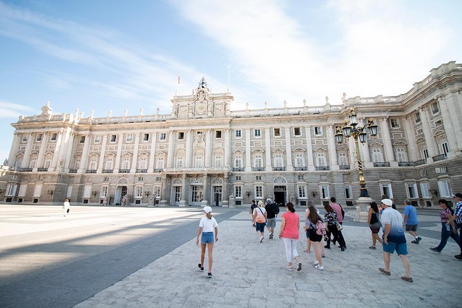 Madrid: Royal Palace Expert Guided Tour with Optional Tapas - Plaza de Isabel II Meeting Point and the Real Rhythm of the Tour