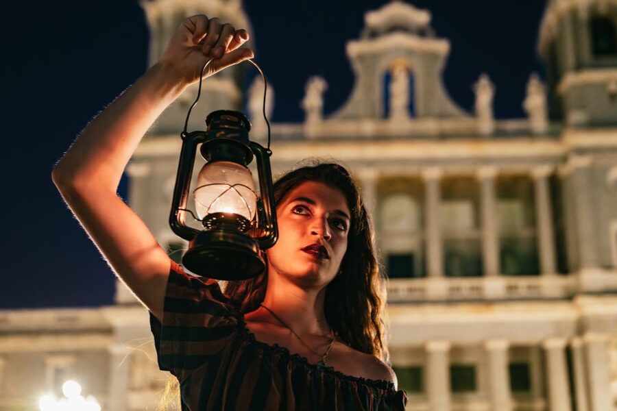 Madrid: Spanish Inquisition and Legends Evening Walking Tour - Weather Reality: Umbrella, Cold Air, and Street Noise