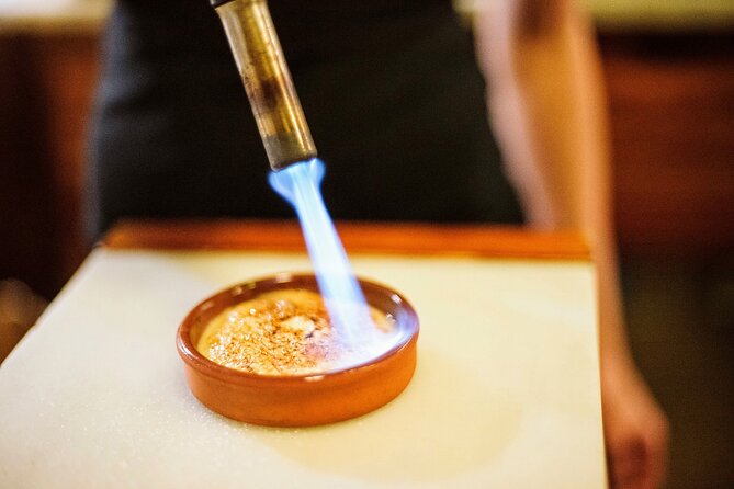 Madrid Tapas & Paella Cooking Experience with Local Market Visit - Ferretería Restaurante kitchen time, sweet vermouth included