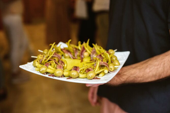 Madrid Tapas & Paella Cooking Experience with Local Market Visit - Lunch you actually sit down to, plus fruit dessert