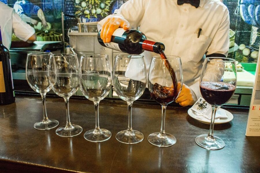 Madrid: Tapas & Wine Tasting Tour with Local Guide - Wine and drinks: one included pour per stop