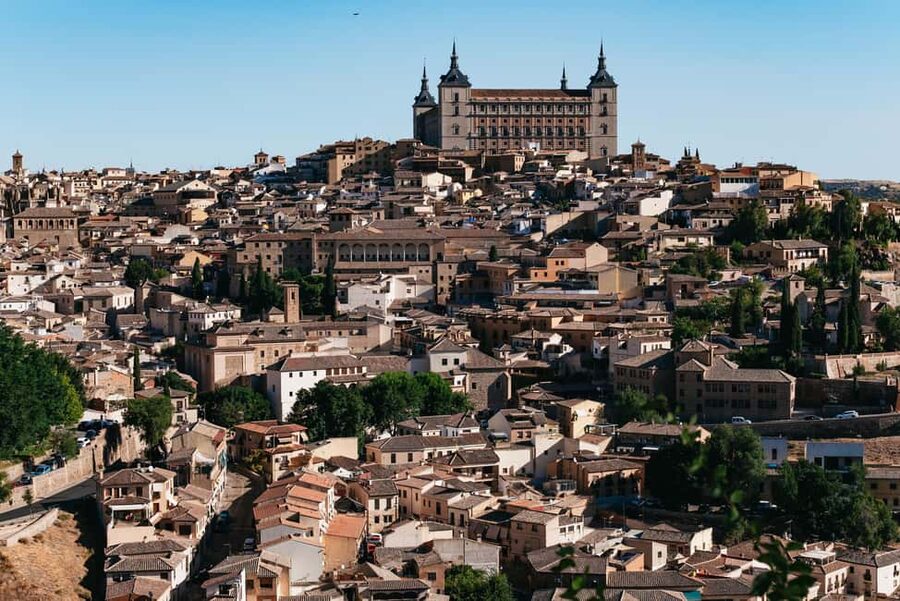 Madrid: Toledo & Segovia Full Day Guided Tour with Alcázar - Toledo walking tour: turning old streets into a story you can follow