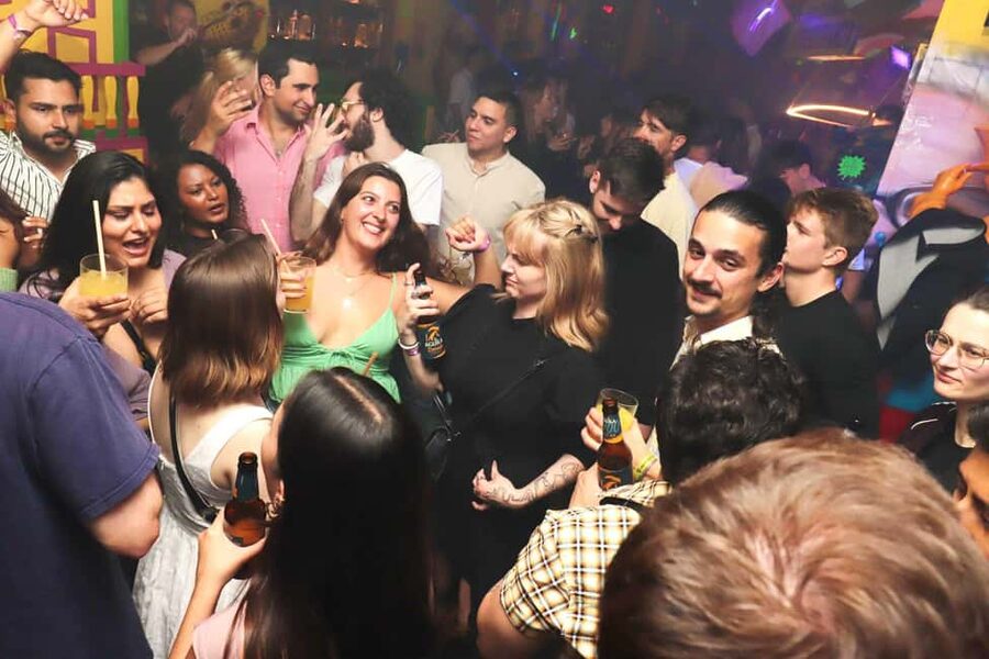 Madrid: Top Pub-Crawl with Drinks and Nightclub Entry - Las Letras Quarter: dancing becomes part of the schedule