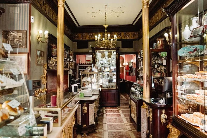 Madrid: Ultimate Food Tour of Local Markets & Tapas - Mercado de Antón Martín: Olives, Cured Meats, Olive Oil, and Vermouth Lessons