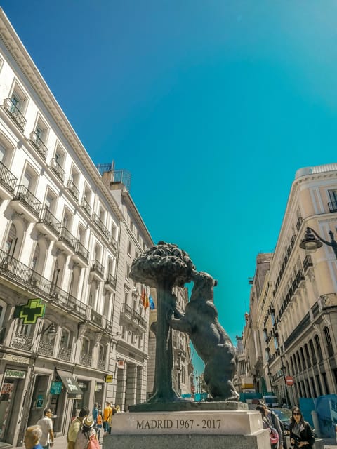 Madrid: Welcome to Madrid Guided Walking Tour in English - Royal Palace to Almudena Cathedral: power with different architectural flavors