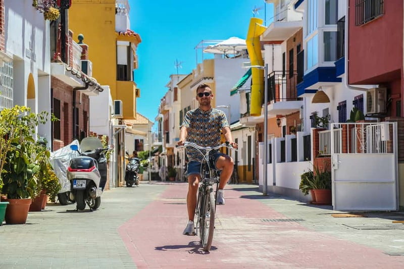 Malaga: Castle Hill and Fisherman Village E-Bike Tour - Key highlights worth circling