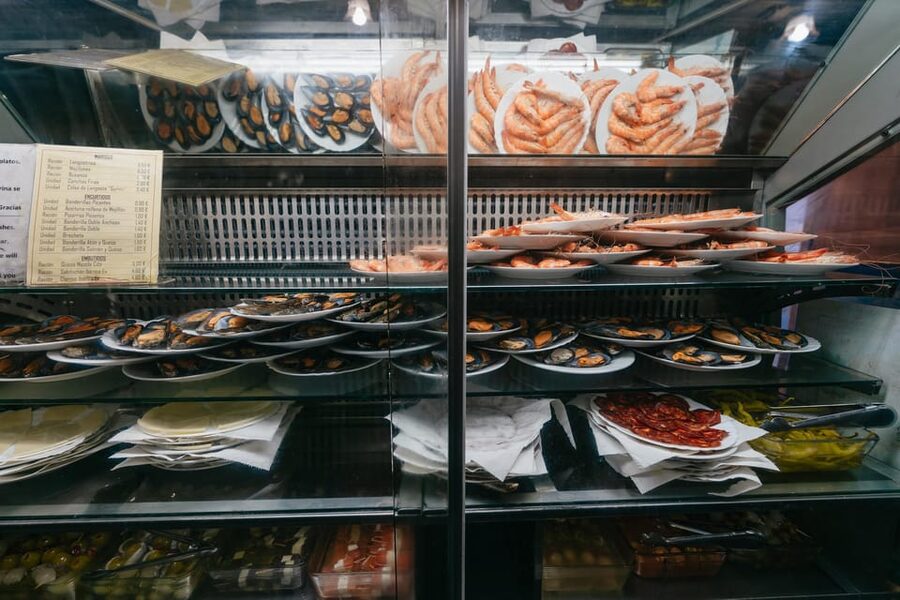 Málaga: Traditional Andalusian Tapas and Wine Tour - Stop 3: Neighborhood Bars, Vermouth, and the Local Rhythm
