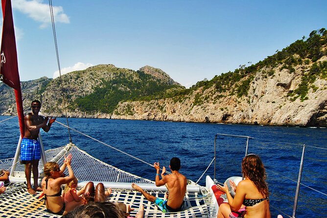 Mallorca Catamaran Tour in the Bay of Pollensa - Lunch at anchor: pasta salad, chicken, and drinks on board