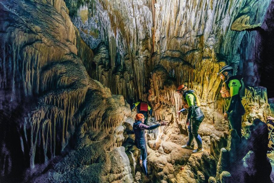 Mallorca: Cova des Coloms Caving Trip with Hotel Transfer - Inside Cova des Coloms: limestone formations and natural pools