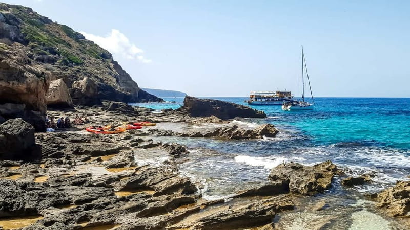 Mallorca: Sea Cave Kayaking Tour with Snorkeling and a Snack - Safety and support: motorboat, supervision, and real-world conditions