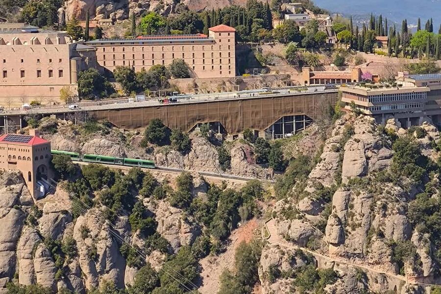 Montserrat Small Group Tour with Train and Cable Car - Cable car up: 10 minutes that are pure mountain theater