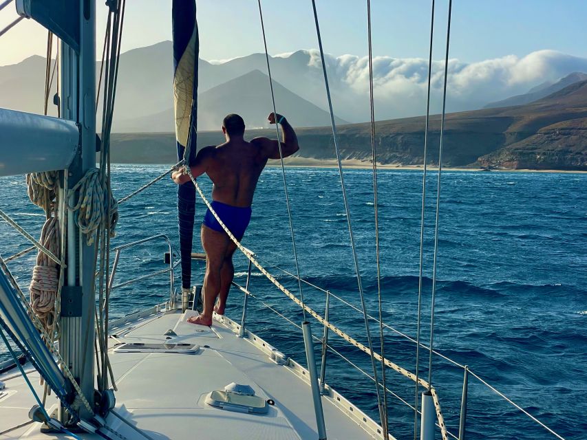 Morro Jable: Sailing Boat Excursion with Food and Drinks - Swim and snorkeling: where marine life and clear water take over