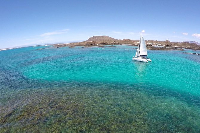 OBY Catamaran - Lunch at sea: salad, fruit, and mixed paella onboard