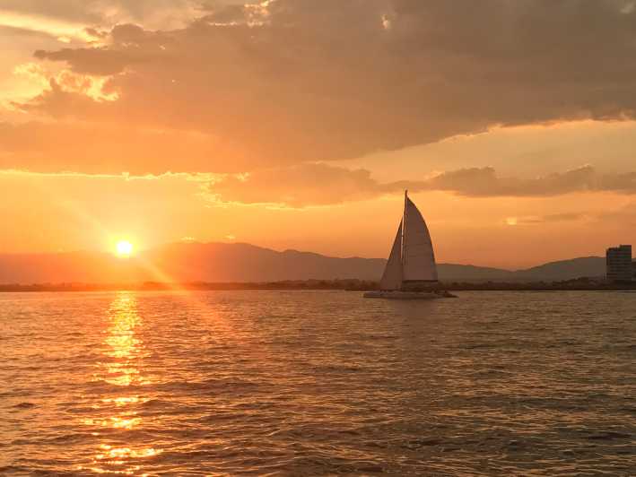 Palma de Mallorca: Sunset Sailing Catamaran Trip with Drink - Boarding the Catamaran, Drinks, and the Onboard Vibe