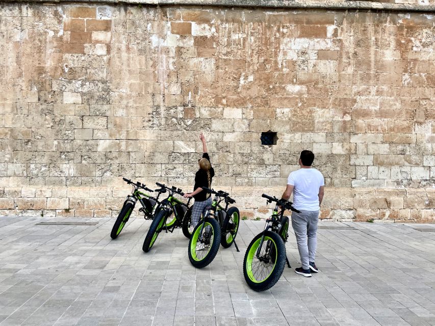 Palma: Guided City Tour with a Fat Tire E-Bike - Traditional window displays, Portixol cafes, and where locals actually spend time