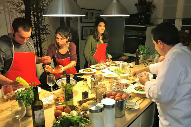 Premium Paella Cooking Class & 10 Spanish Tapas - Boqueria market, chef stories and what to notice