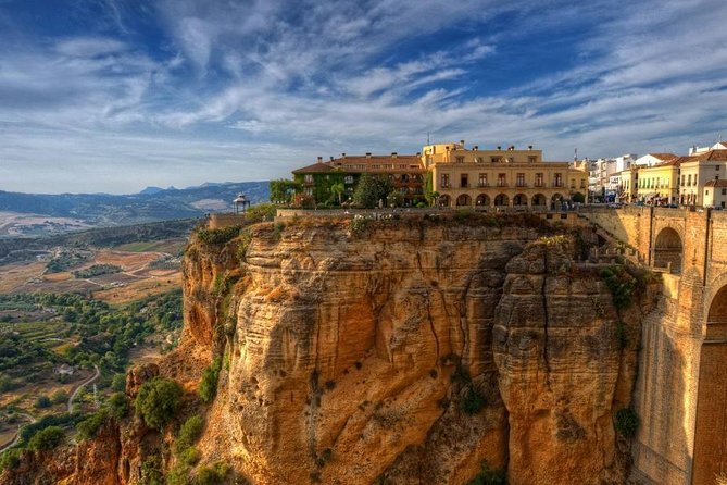 Private Guided Day Trip to the White Villages and Ronda from Seville - Setenil de las Bodegas: houses in the rock, 1 hour to get it all
