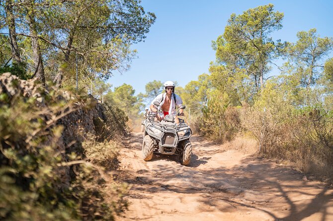 Quad Bike / ATV Tour - The Ride to Randa Mountain: Forest Roads, Curves, and the Monastery View